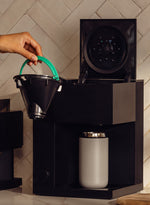 Fellow Aiden Precision Coffee Maker brewing fresh coffee with thermal carafe